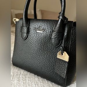 Kate Spade cross-body mini bag. Black with gold details